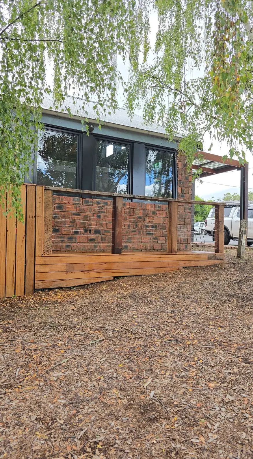 Recycled hardwood deck and timber balustrade built by Alfredini Construction
